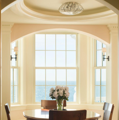 A dining table with an ocean view.