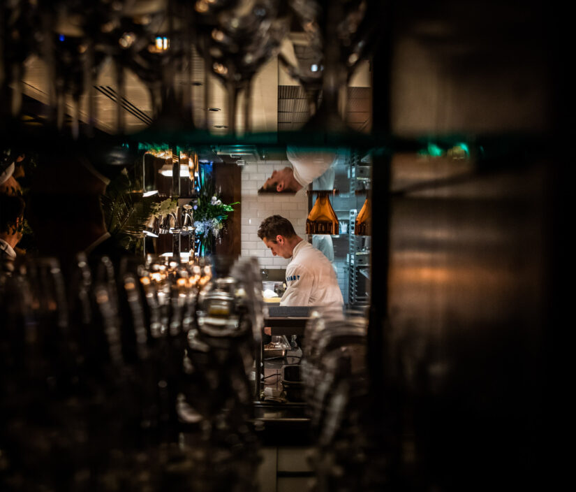 A chef working in a kitchen.